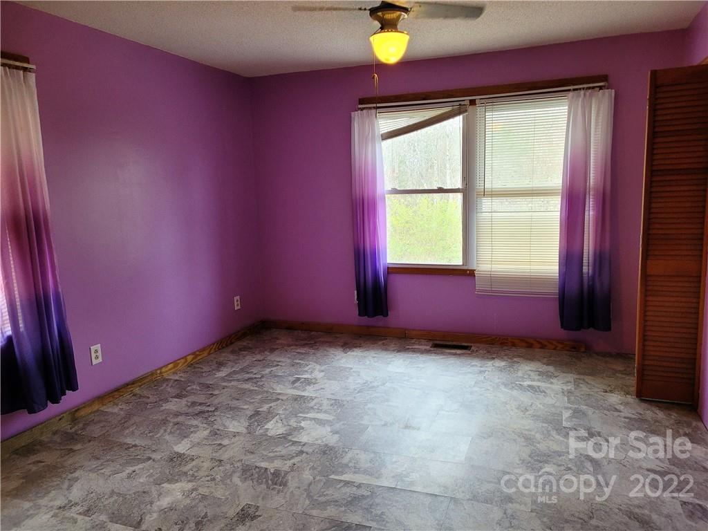 941 Engineer Road Bostic, NC 28018 - Photo 9 of 29 an empty room with windows