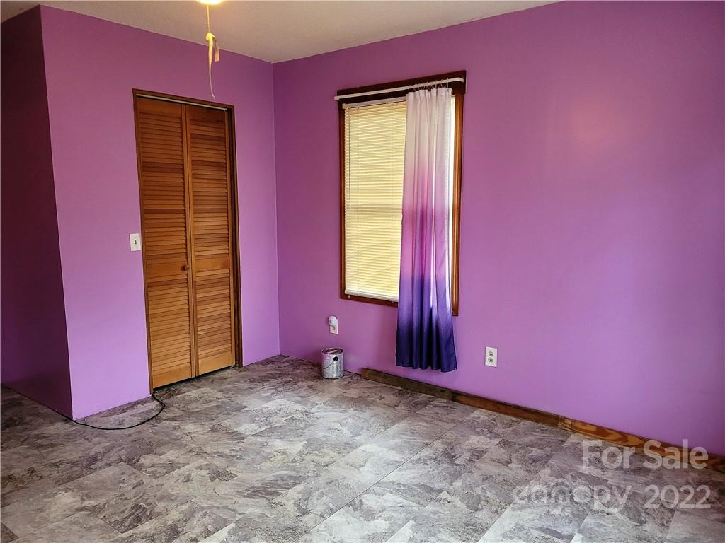 941 Engineer Road Bostic, NC 28018 - Photo 10 of 29 a view of a room with red walls and a window
