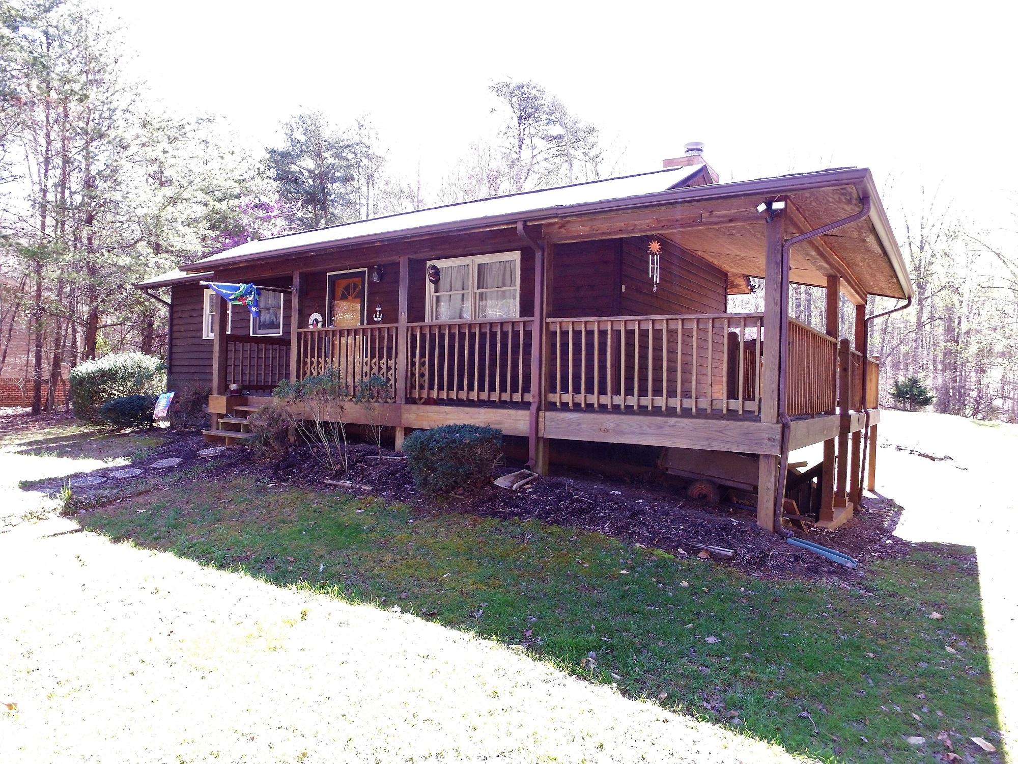 214 Highland Lake Road Union Hall, VA 24176 - Photo 1 of 33 a view of a house with a yard
