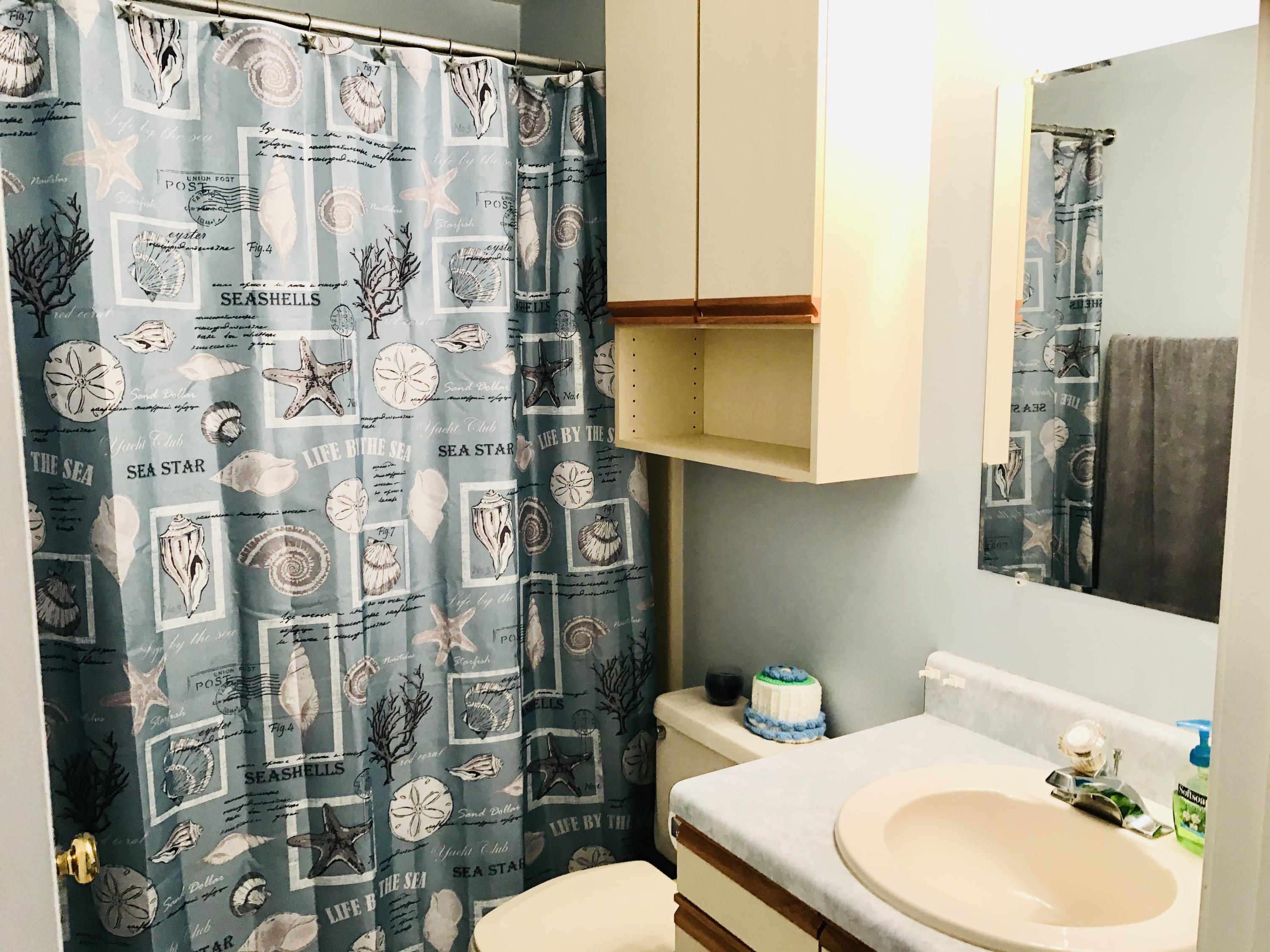 214 Highland Lake Road Union Hall, VA 24176 - Photo 15 of 33 a bathroom with a sink toilet and shower