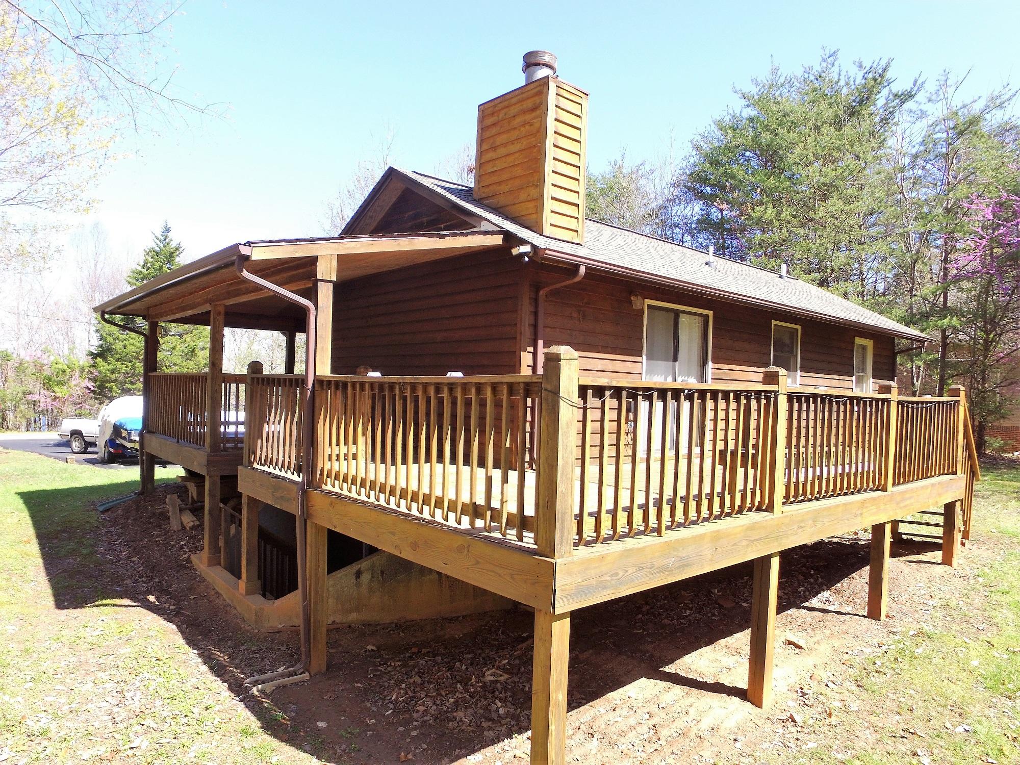 214 Highland Lake Road Union Hall, VA 24176 - Photo 3 of 33 a front view of a house with a yard