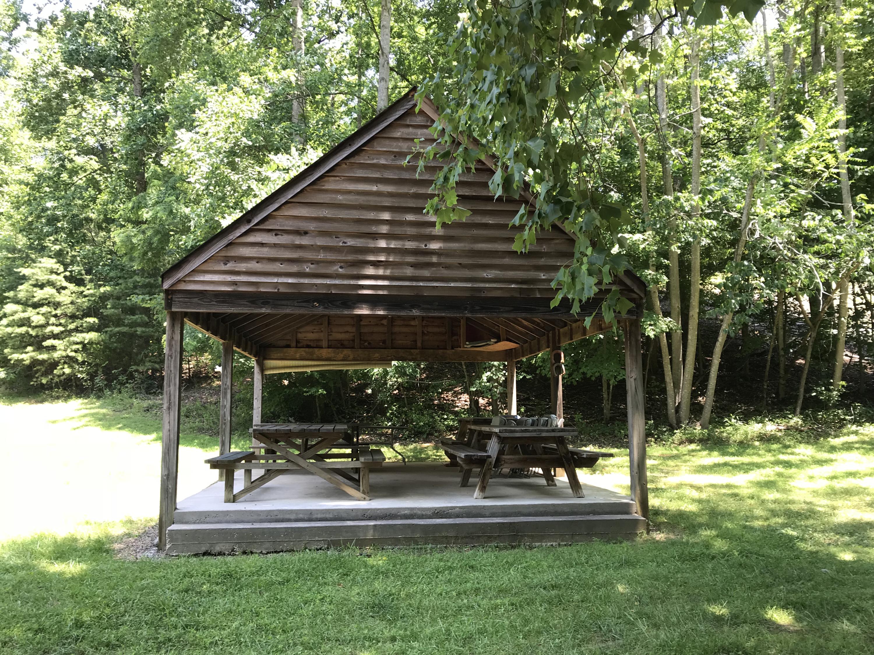 214 Highland Lake Road Union Hall, VA 24176 - Photo 26 of 33 a view of a house with backyard and sitting area
