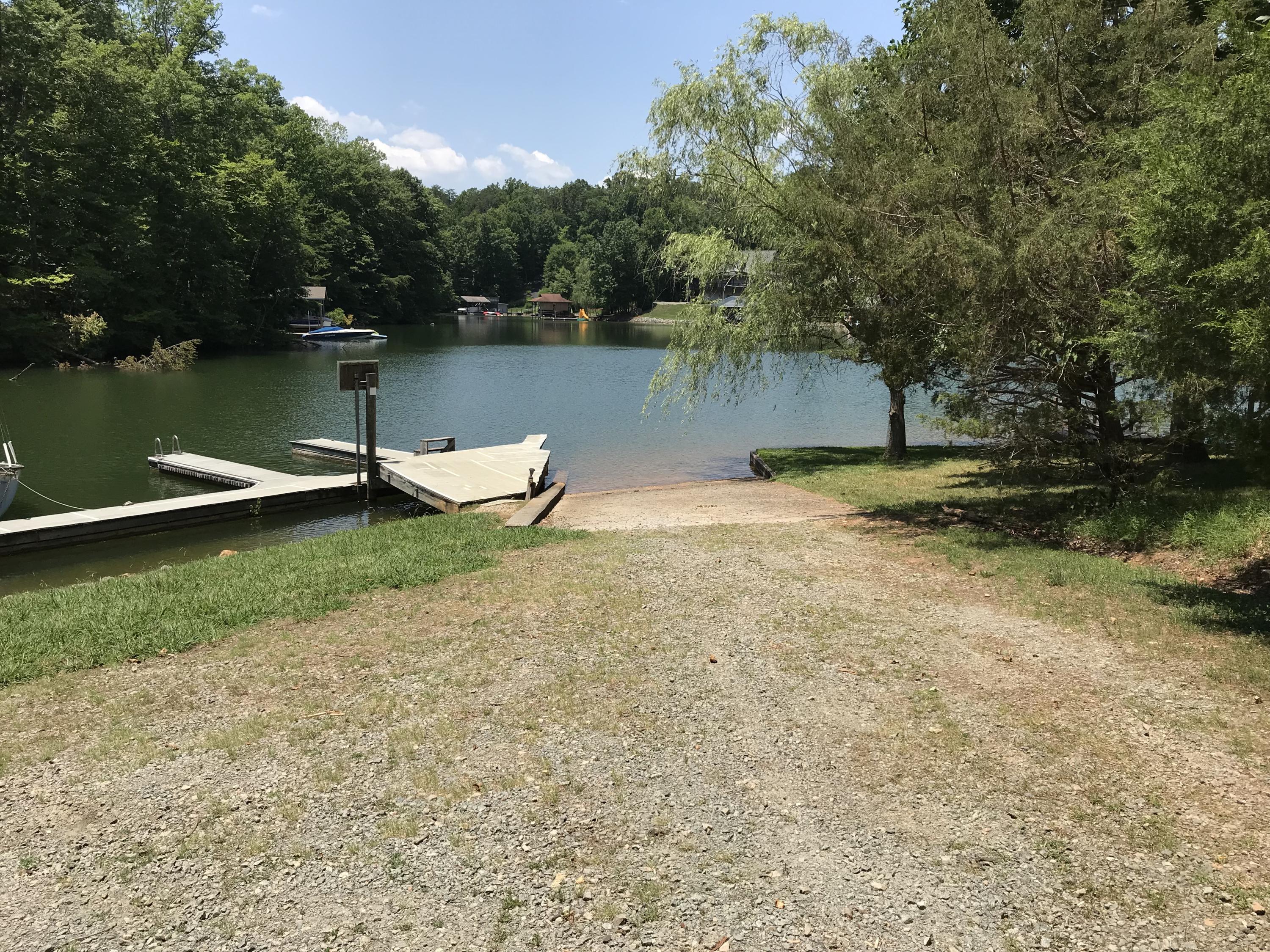 214 Highland Lake Road Union Hall, VA 24176 - Photo 29 of 33 a view of a lake with a park