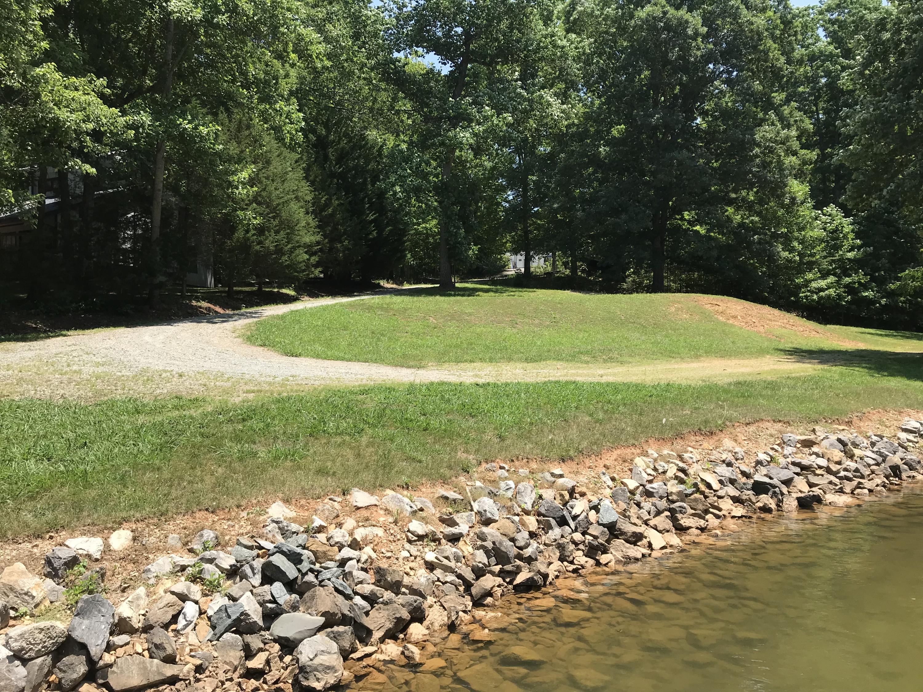 214 Highland Lake Road Union Hall, VA 24176 - Photo 30 of 33 a view of a golf course with a lake