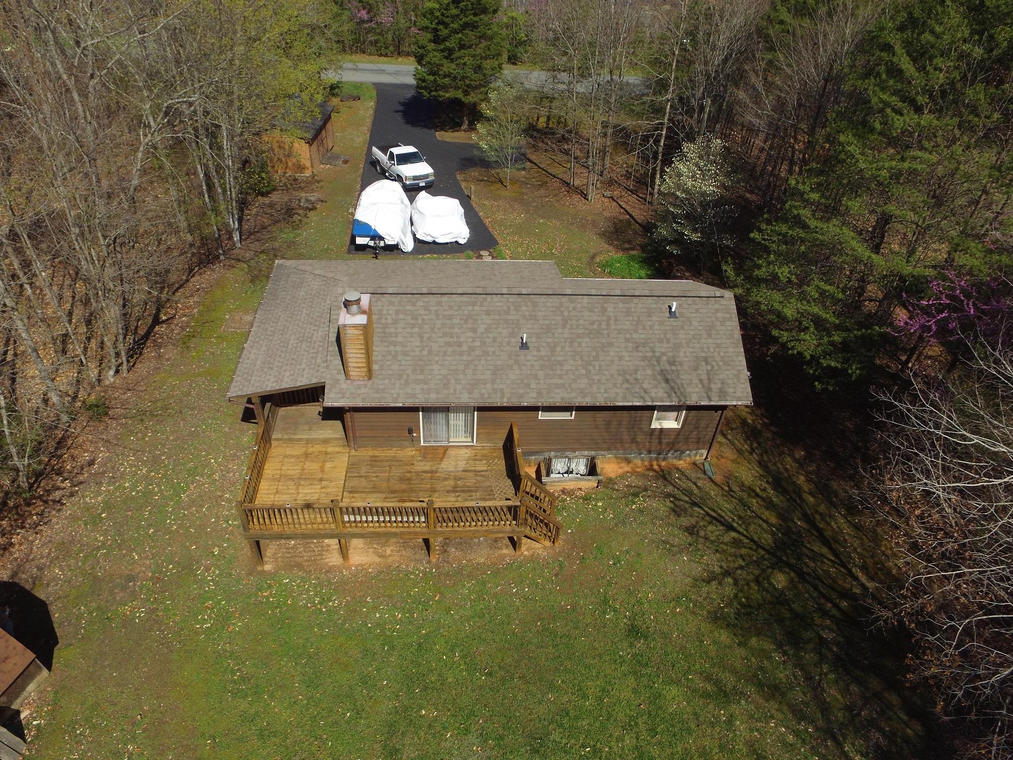214 Highland Lake Road Union Hall, VA 24176 - Photo 5 of 33 an aerial view of a house with swimming pool outdoor seating and yard