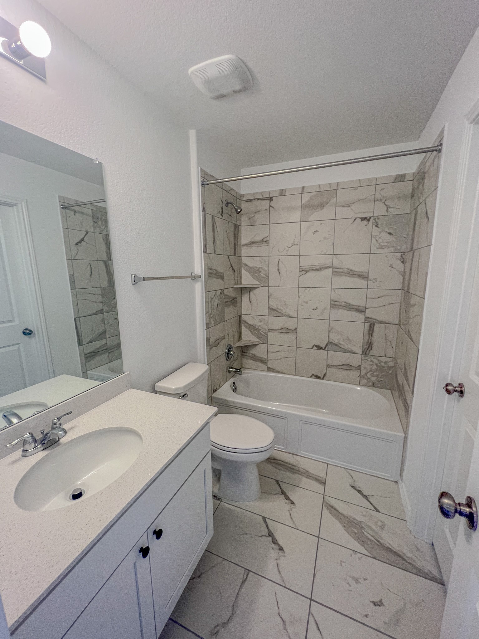 438 Perfect World Loop Jarrell, TX 76537 - Photo 31 of 35 a bathroom with a sink a toilet and shower