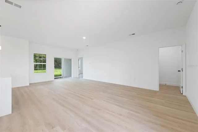 an empty room with windows