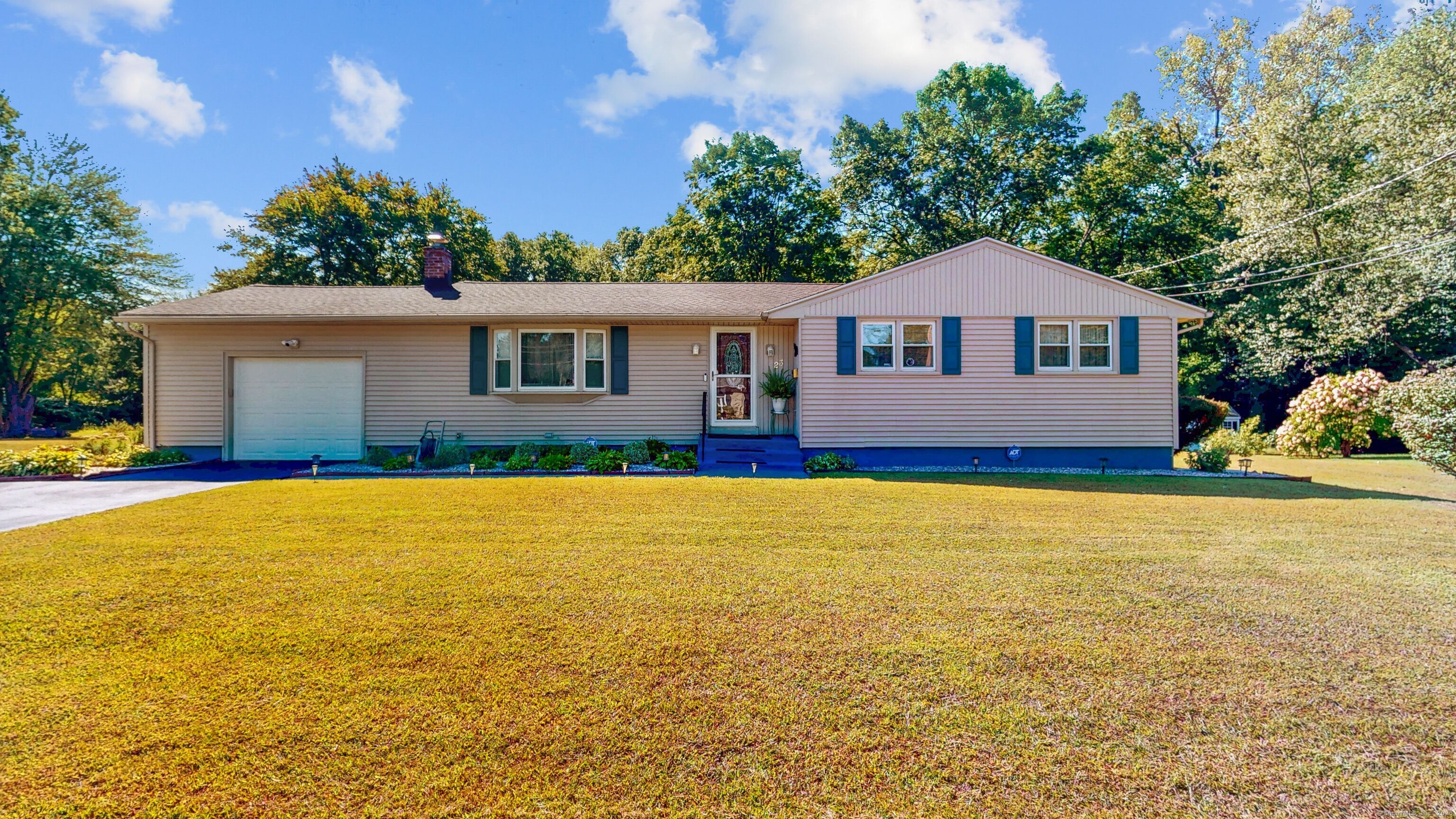 a house view with a garden space