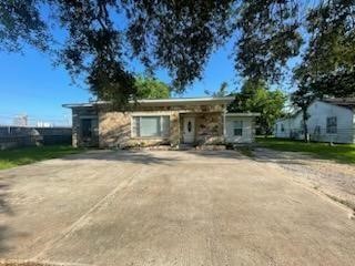 1114 East Pecan Street Angleton, TX 77515 - Photo 20 of 20 front view of a house with a tree
