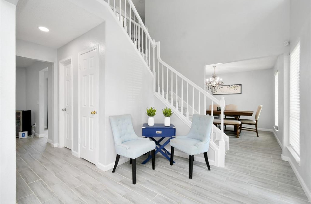 10234 Tablerock Drive Houston, TX 77064 - Photo 4 of 20 a living room with furniture and a wooden floor