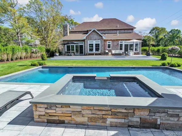 a aerial view of a house with swimming pool