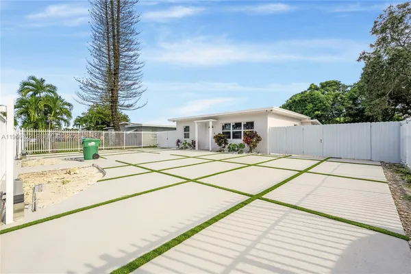 a house with trees in the background
