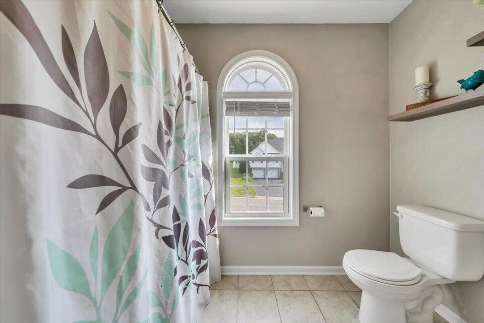 522 Cambridge Ct Road Vinton, VA 24179 - Photo 18 of 32 a view of a entryway with a flower pot and a window