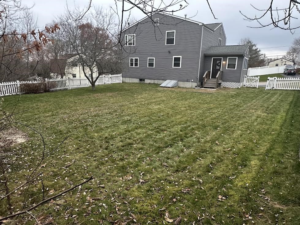 73 Service Road West Warwick, RI 02893 - Photo 6 of 32 Fenced Back yard w Bulkhead Basement Access