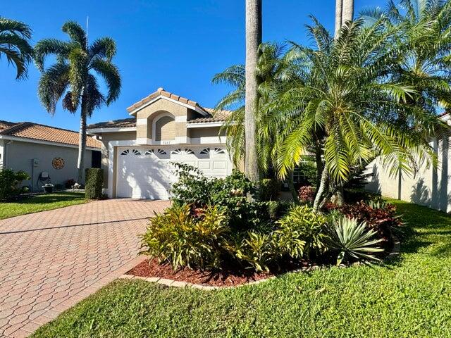 7687 Cherry Blossom Street Boynton Beach, FL 33437 - Photo 2 of 37 front