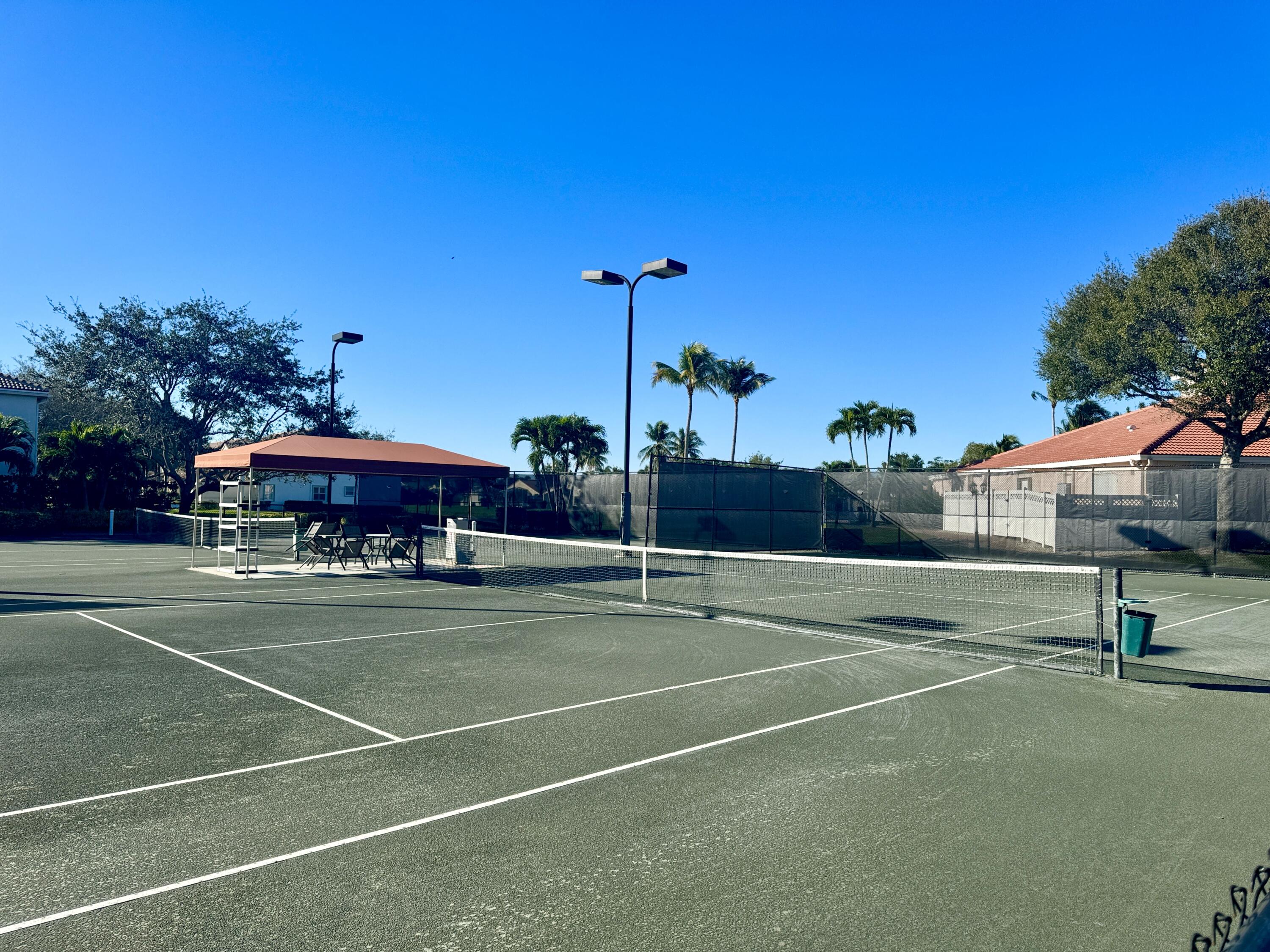7687 Cherry Blossom Street Boynton Beach, FL 33437 - Photo 31 of 37 tennis courts