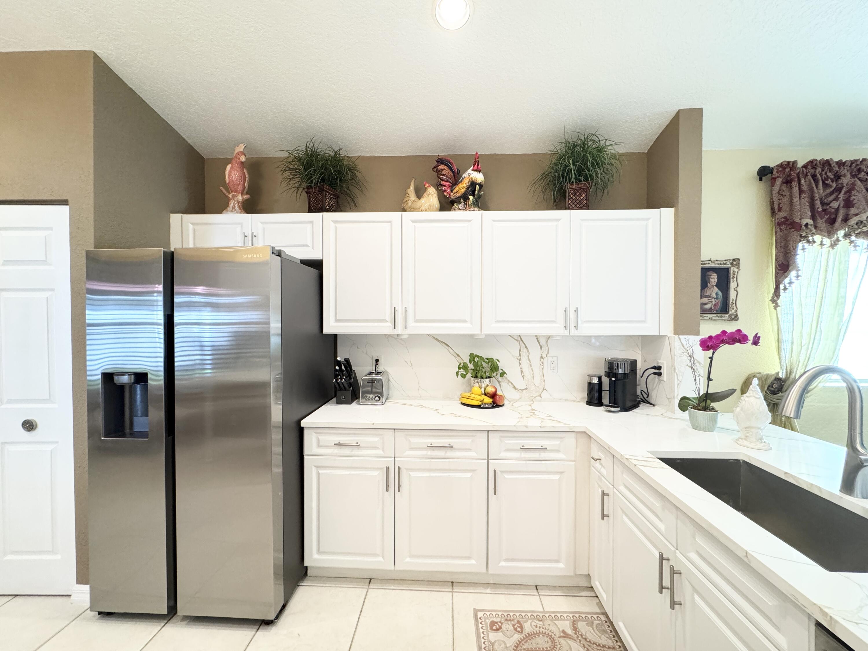 7687 Cherry Blossom Street Boynton Beach, FL 33437 - Photo 4 of 37 kitchen
