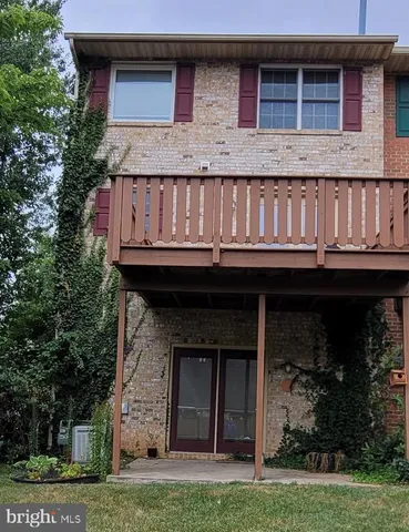 a front view of a building with garden