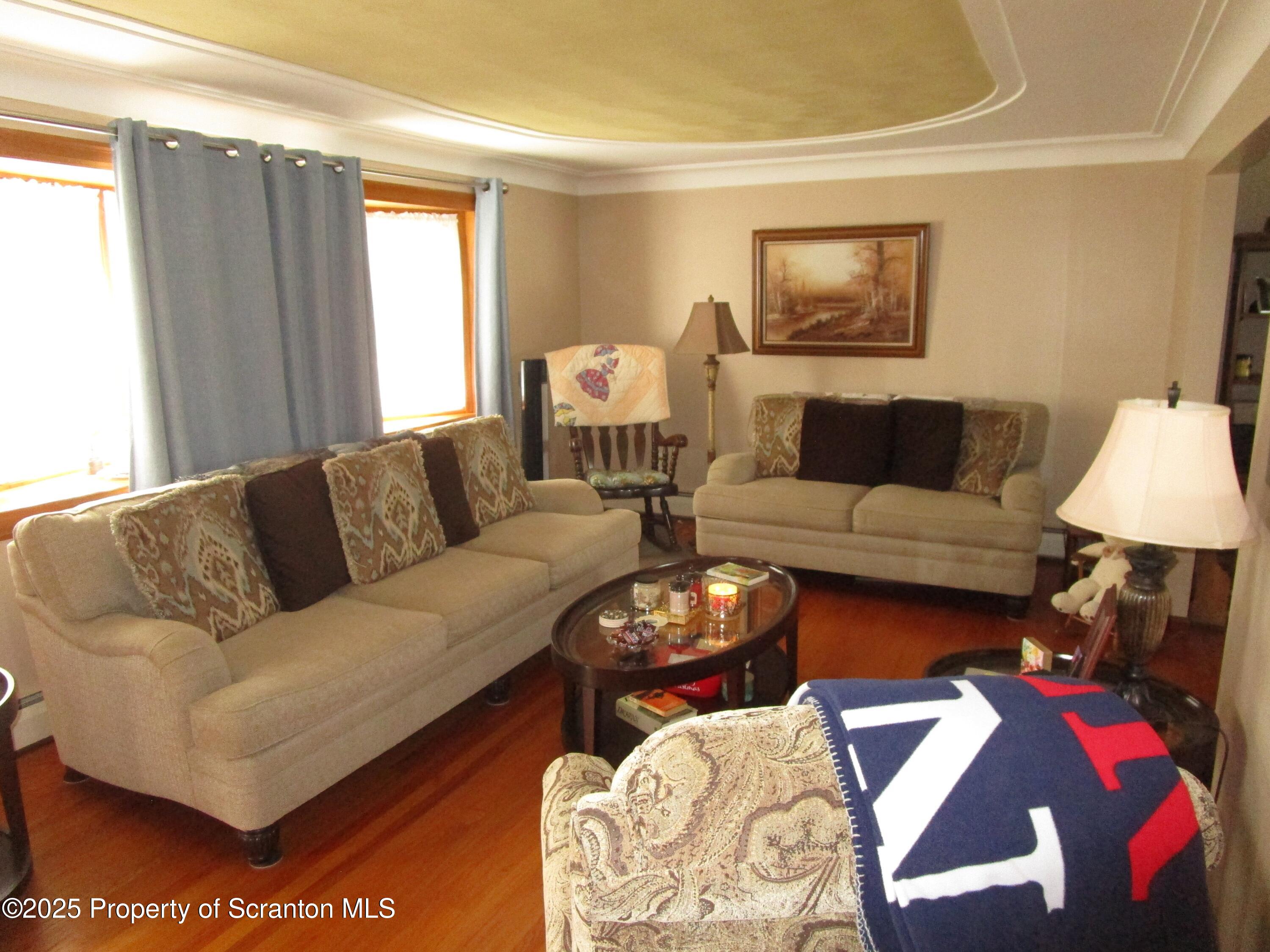 715 Moritz Street Dunmore, PA 18512 - Photo 3 of 14 a living room with furniture and a couch