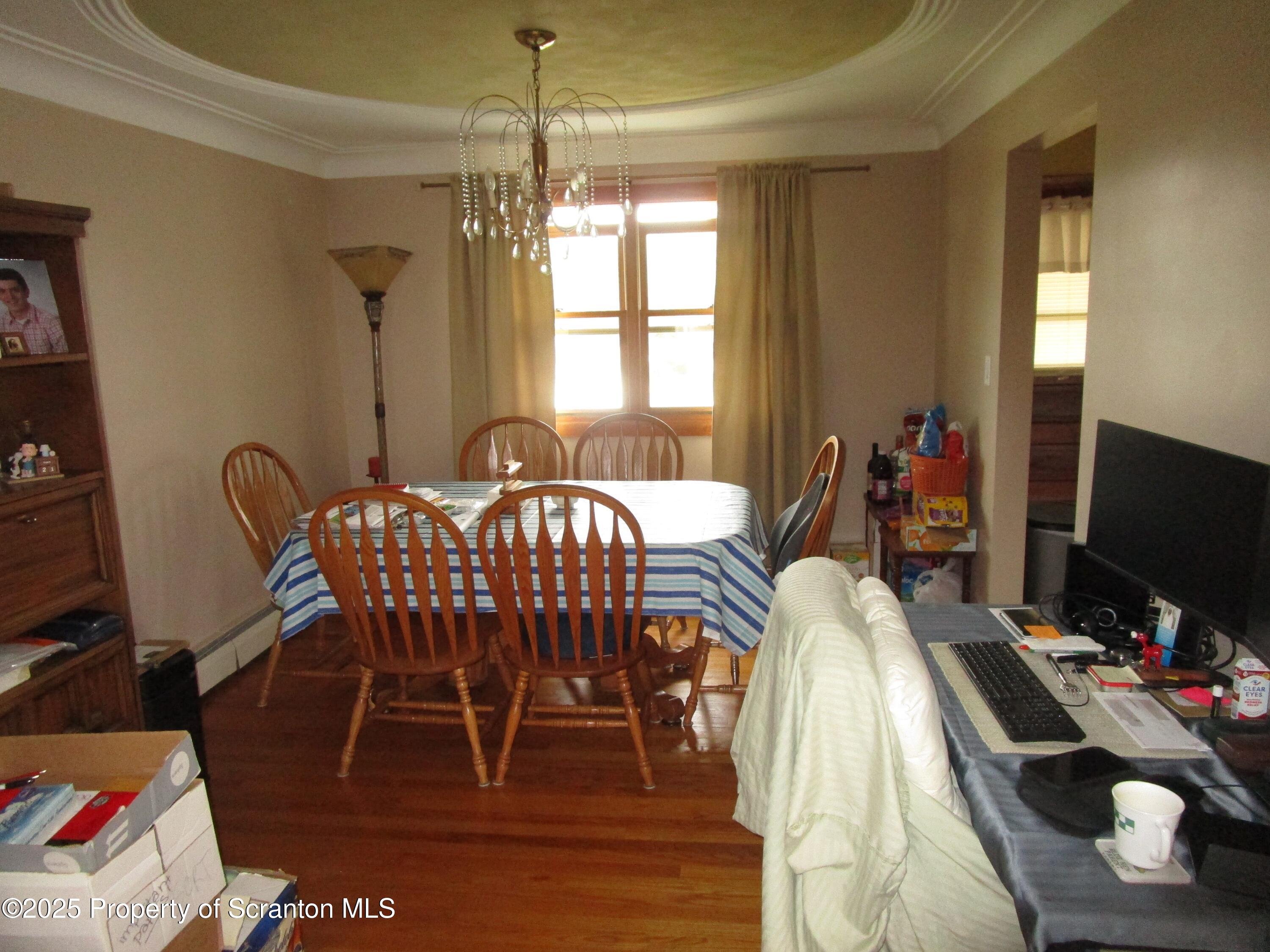 715 Moritz Street Dunmore, PA 18512 - Photo 4 of 14 a bedroom with furniture and a flat screen tv