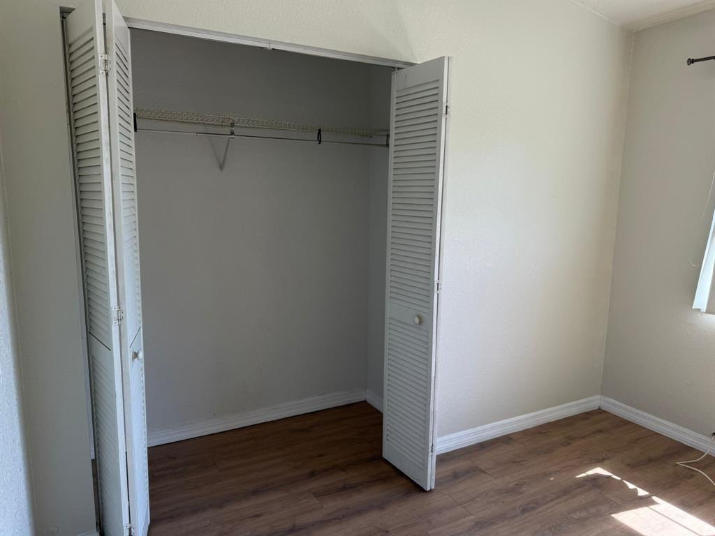 1943 Garfield Street Hollywood, FL 33020 - Photo 7 of 10 a view of an empty room with wooden floor