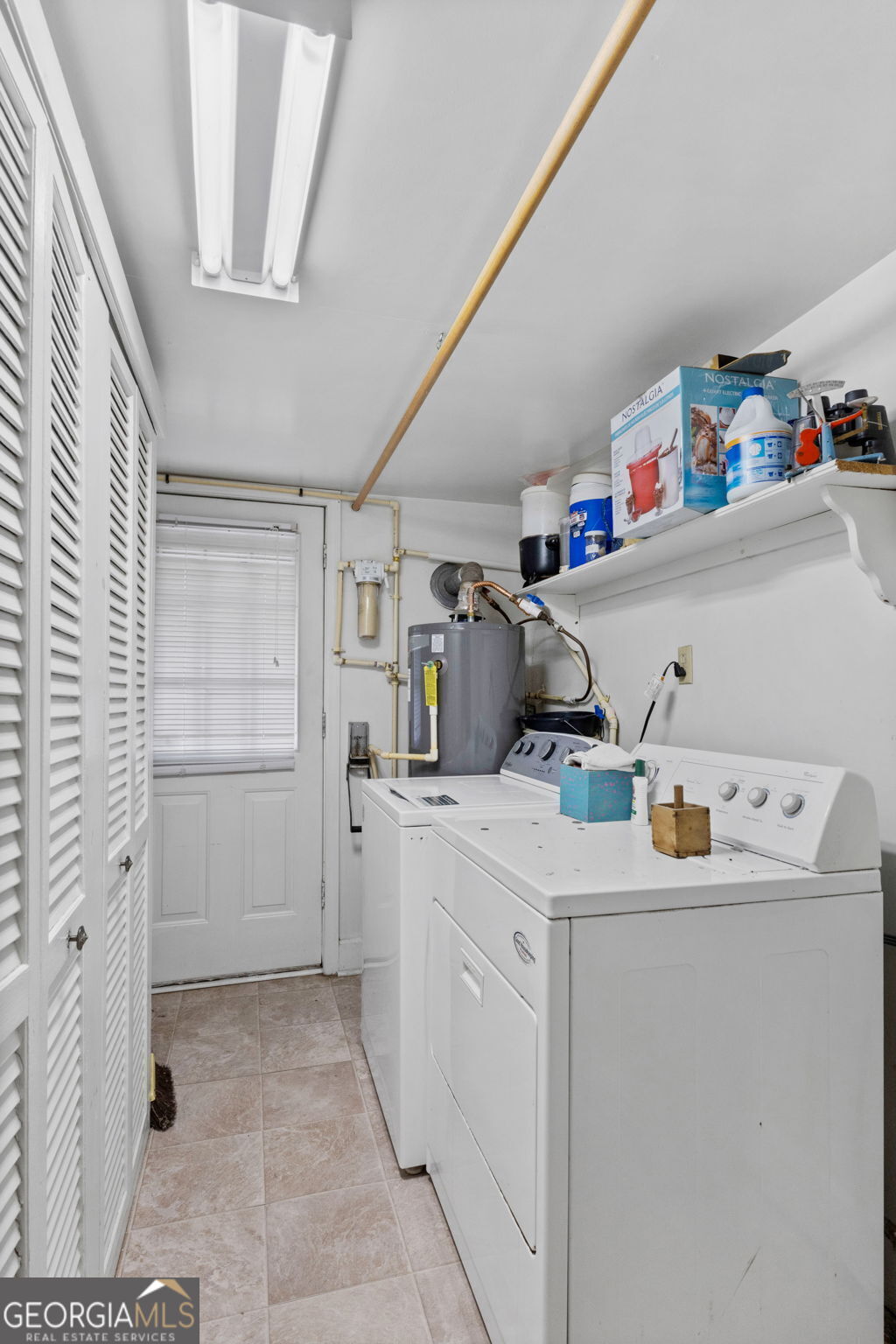 2037 Jeff Davis Road Thomaston, GA 30286 - Photo 19 of 60 a utility room with dryer and washer