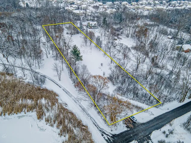 a view of a snow on the road