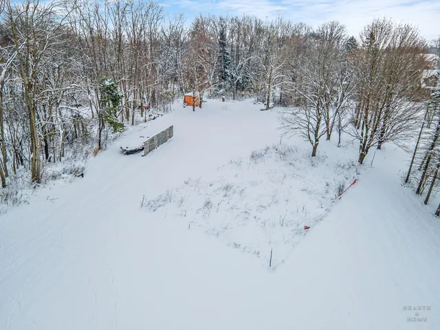 a view of a balcony with wooden stairs