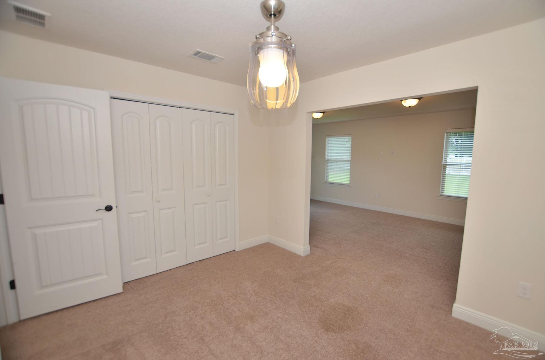 5709 Mill Stream Way Pace, FL 32571 - Photo 33 of 48 wooden floor in a room