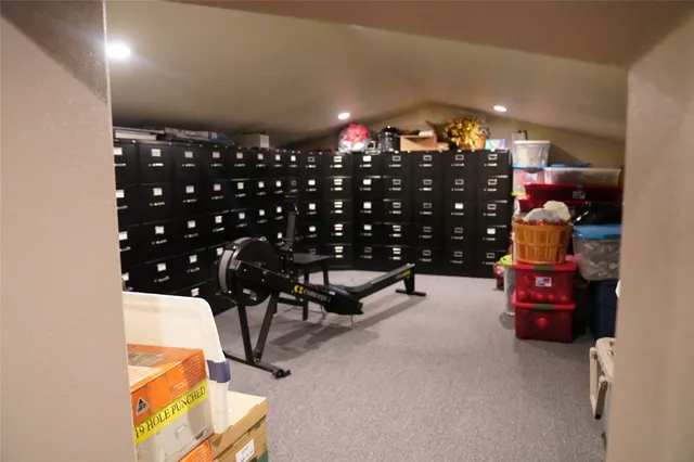 a view of house with backyard