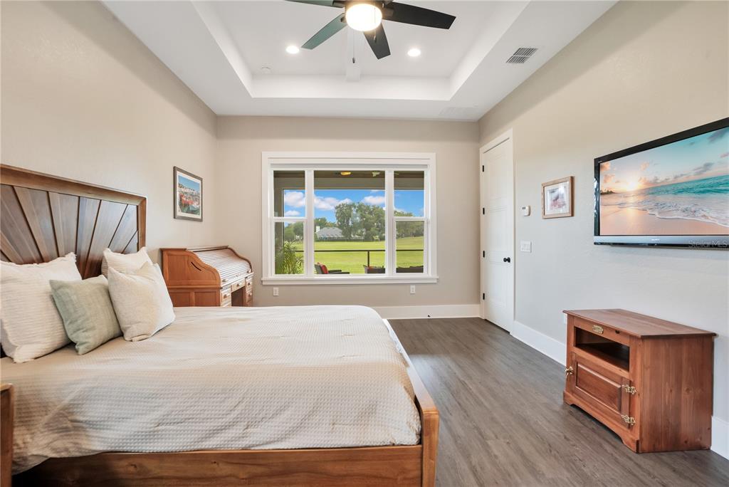 440 Palma Ceia Road Winter Haven, FL 33884 - Photo 6 of 78 a bedroom with a large bed and a window
