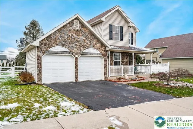a view of a house with a patio