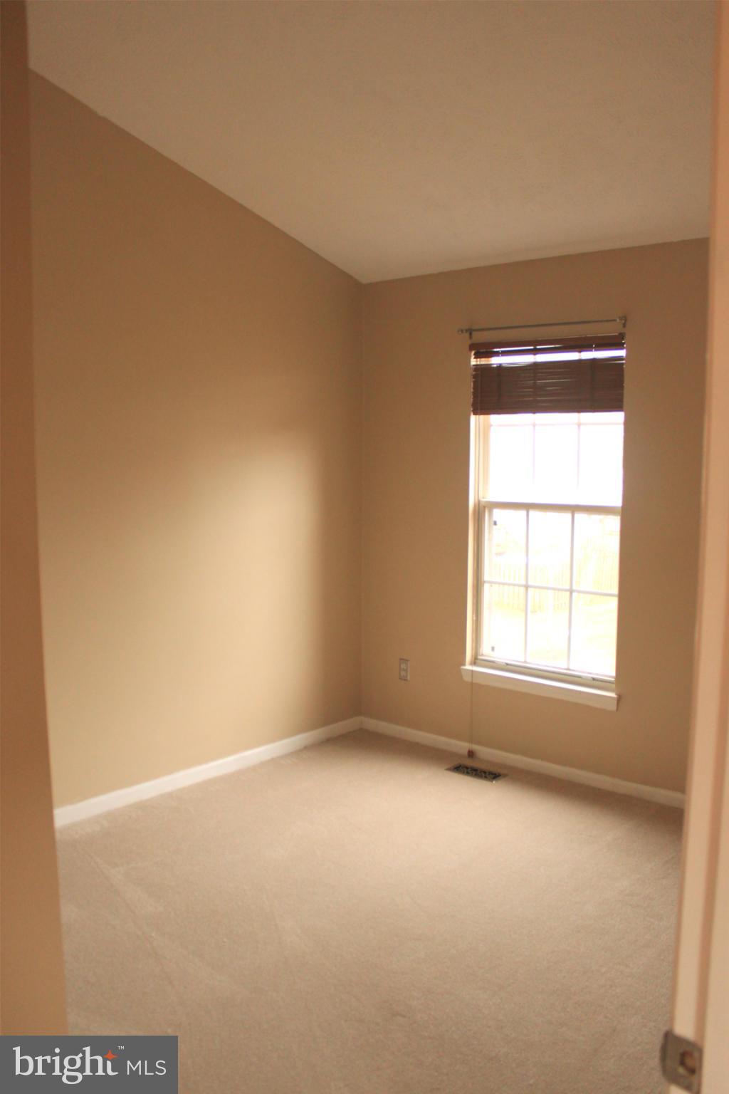 44001 Choptank Terrace Ashburn, VA 20147 - Photo 8 of 11 an empty room with a window