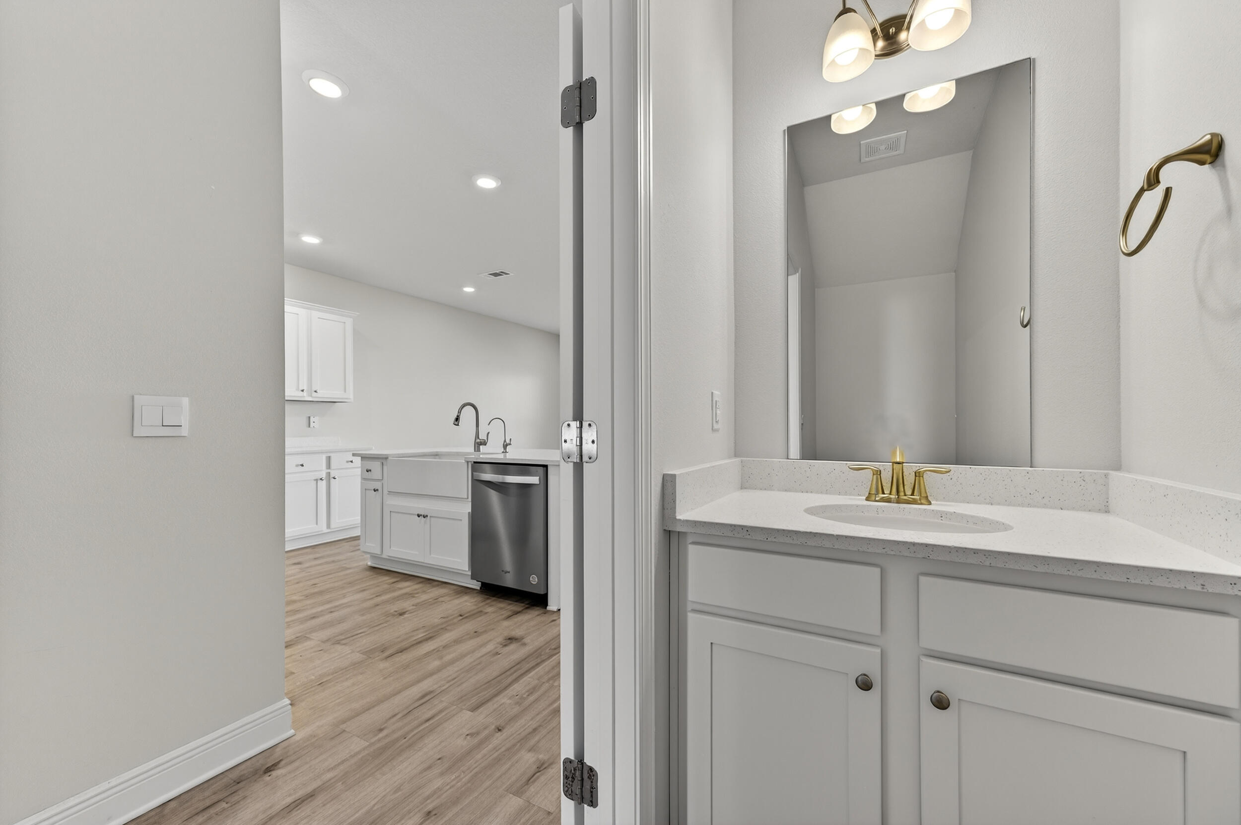 15 Redbird Loop Destin, FL 32541 - Photo 16 of 42 a view of a kitchen from the hallway with a sink