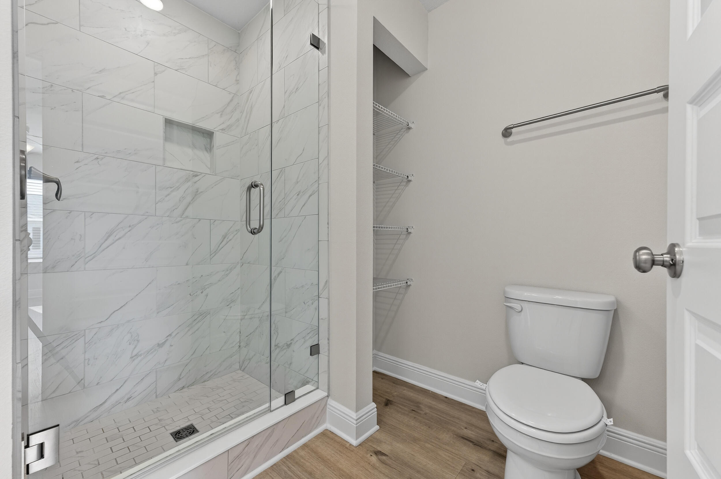 15 Redbird Loop Destin, FL 32541 - Photo 26 of 42 a bathroom with a toilet and a shower