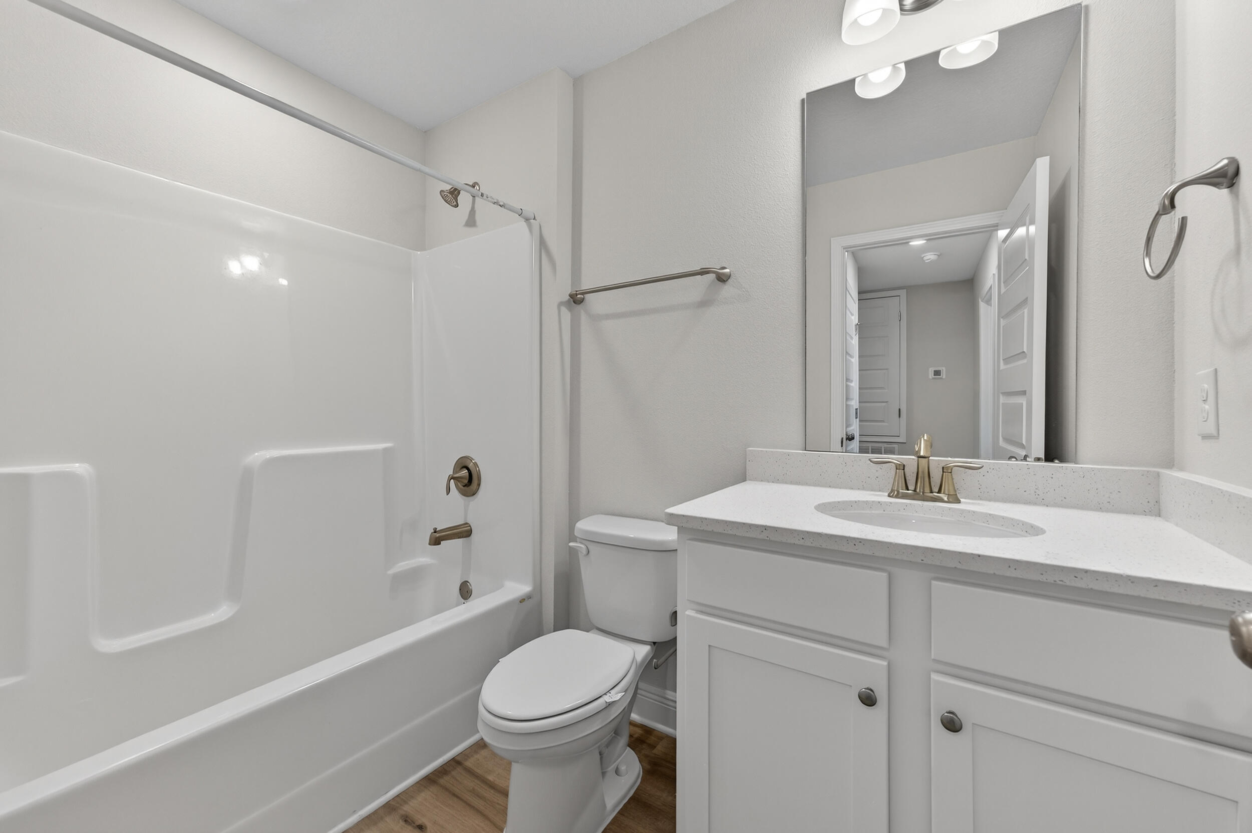 15 Redbird Loop Destin, FL 32541 - Photo 34 of 42 a bathroom with a sink a toilet and shower