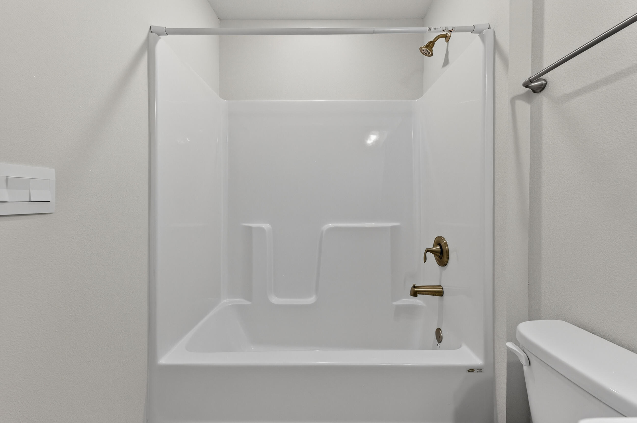 15 Redbird Loop Destin, FL 32541 - Photo 35 of 42 a bathroom with a bathtub and a toilet