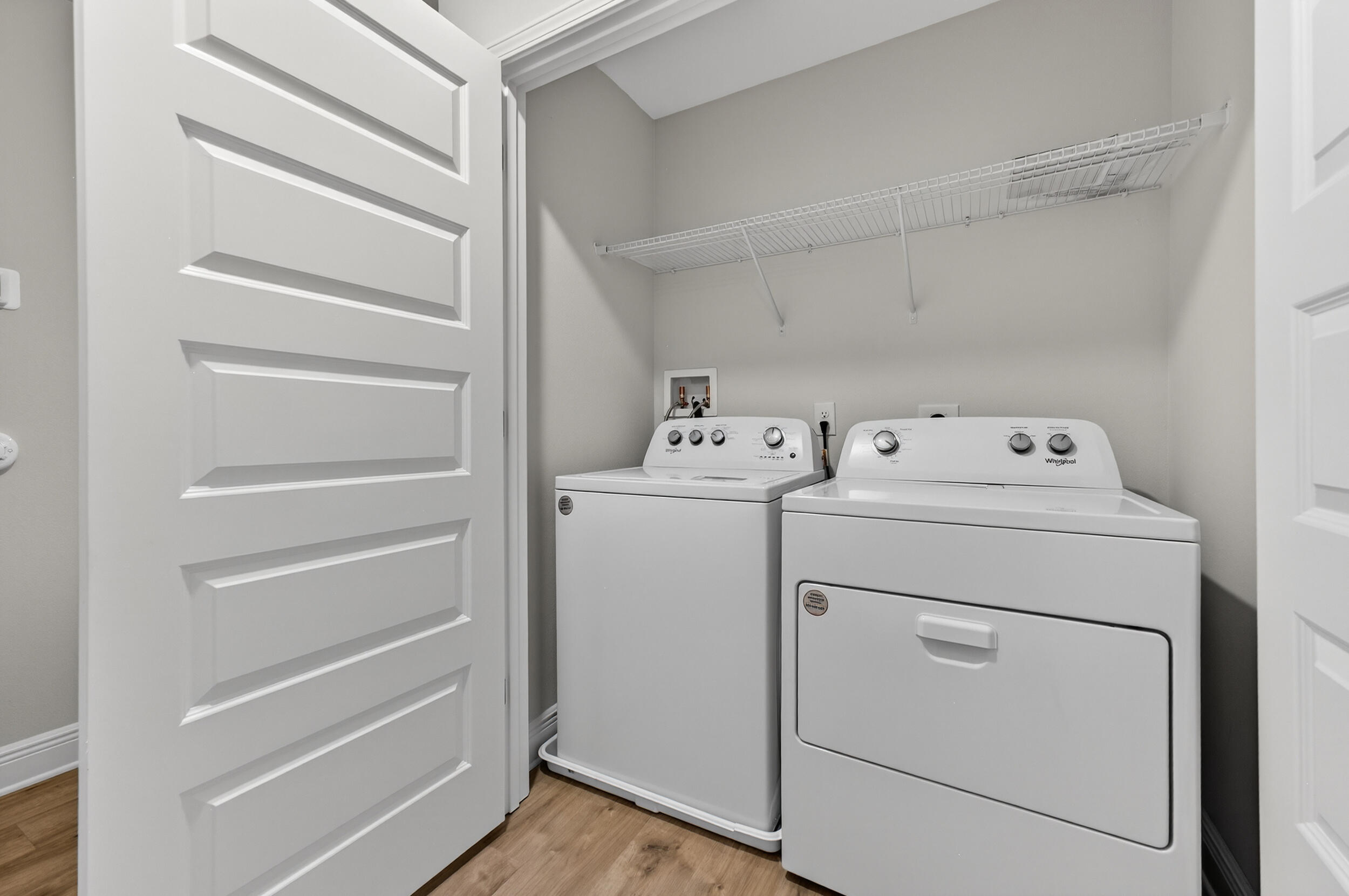 15 Redbird Loop Destin, FL 32541 - Photo 37 of 42 a utility room with dryer and washer