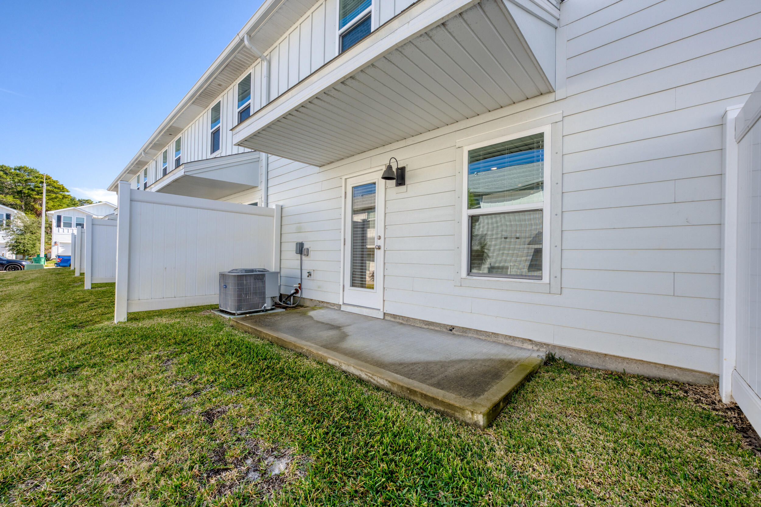 15 Redbird Loop Destin, FL 32541 - Photo 40 of 42 a view of an house with backyard and porch