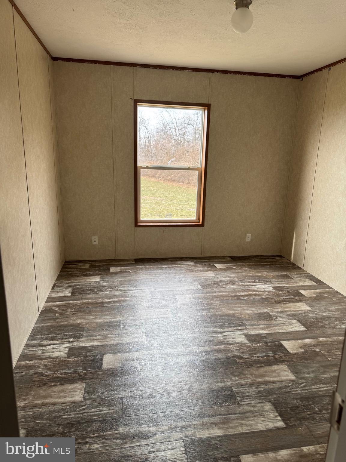 4254 Delta Road Airville, PA 17302 - Photo 4 of 9 a view of an empty room with a window