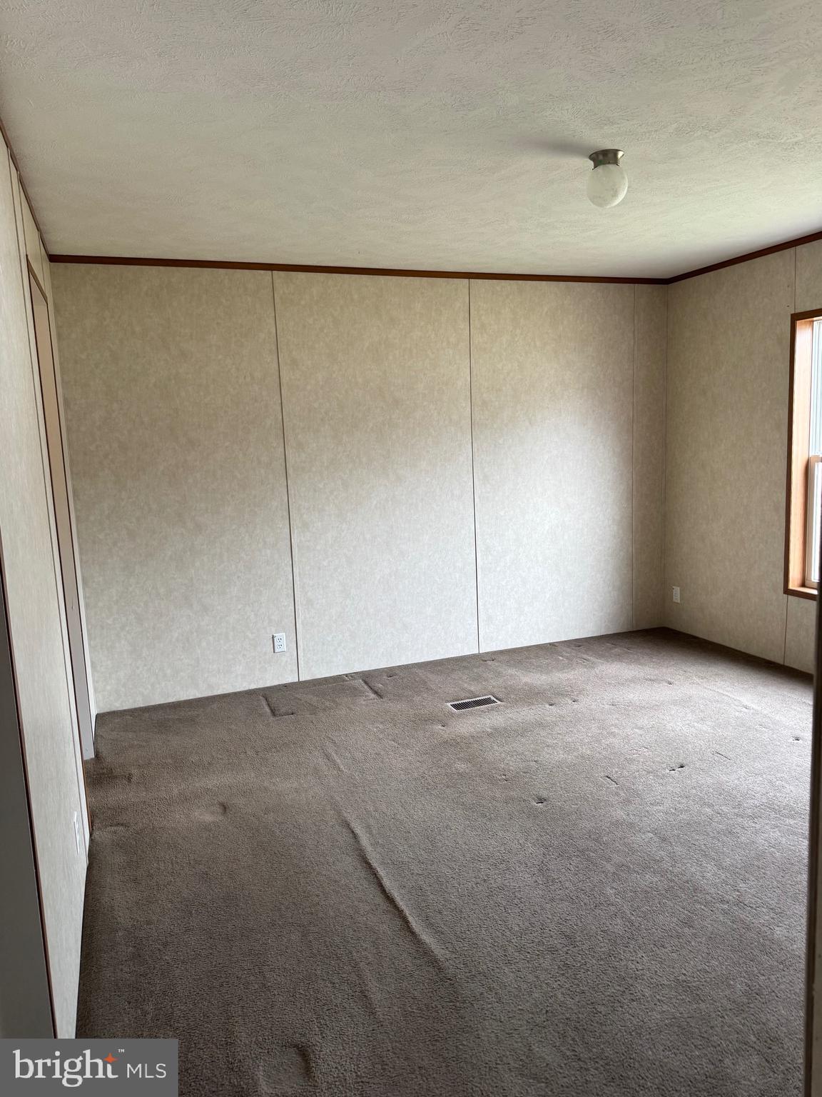 4254 Delta Road Airville, PA 17302 - Photo 6 of 9 a view of an empty room with a window