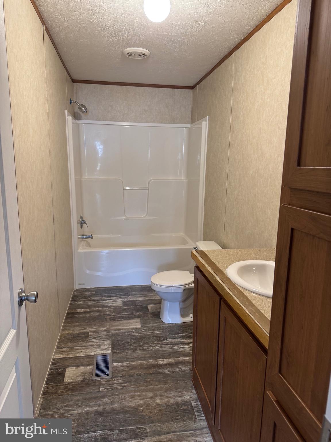 4254 Delta Road Airville, PA 17302 - Photo 8 of 9 a bathroom with a sink a toilet and shower