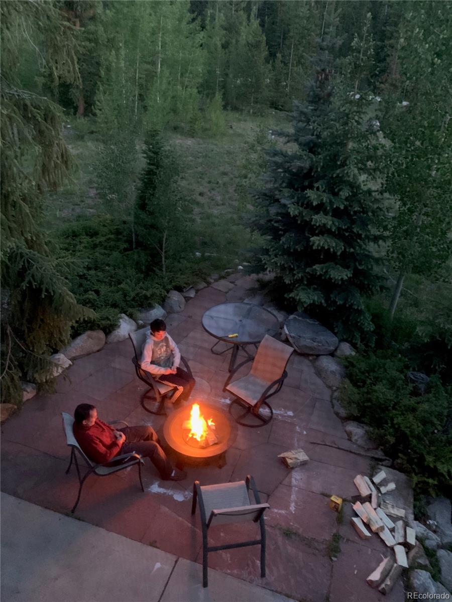 1904 Soda Ridge Road, Unit 1233 Keystone, CO 80435 - Photo 16 of 29 an outdoor sitting area with a fire pit