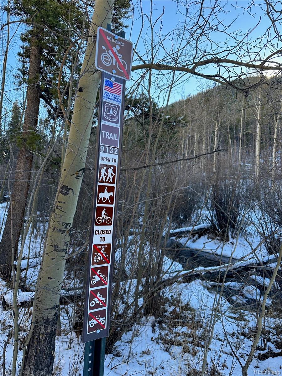 1904 Soda Ridge Road, Unit 1233 Keystone, CO 80435 - Photo 19 of 29 a sign that is on the side of the road