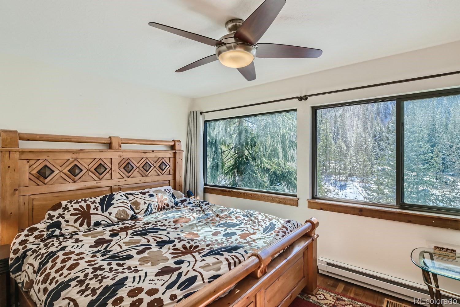 1904 Soda Ridge Road, Unit 1233 Keystone, CO 80435 - Photo 7 of 29 a bed sitting in a bedroom next to a window