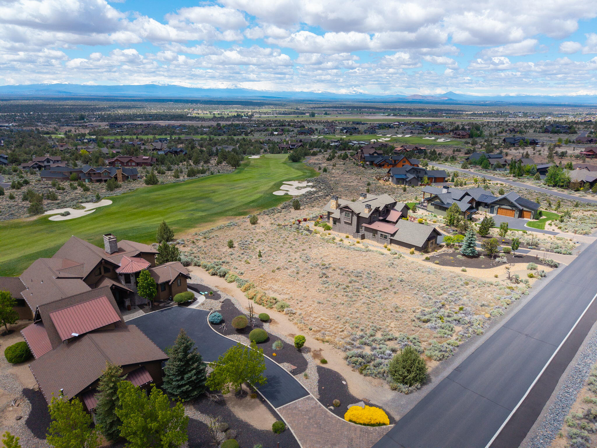 16181 South W Brasada Ranch Road, Unit 115 Powell Butte, OR 97753 - Photo 4 of 25 an aerial view of a residential houses with outdoor space