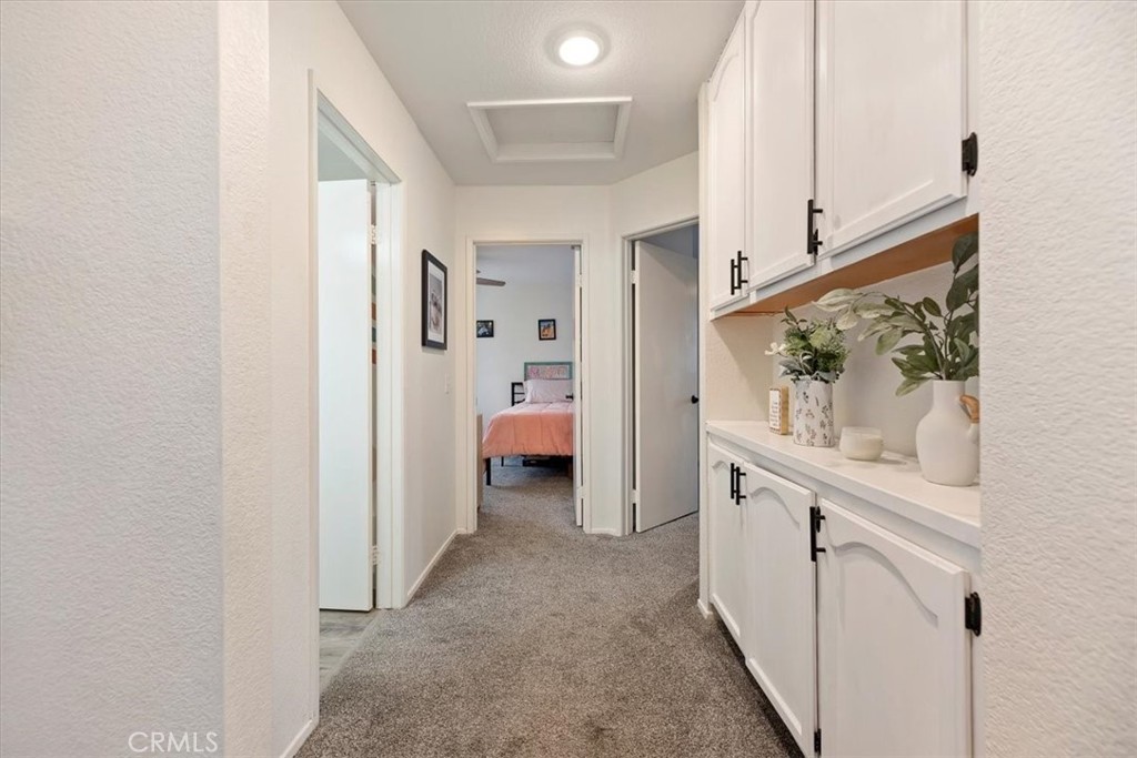 19971 Westerly Drive Riverside, CA 92508 - Photo 31 of 41 Upstairs Hallway loft with storage