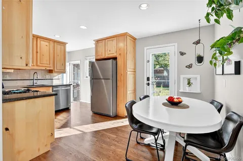 a bedroom with a bed and a desk