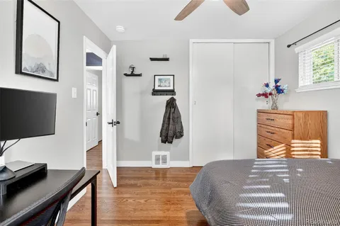 a view of a backyard with sitting area