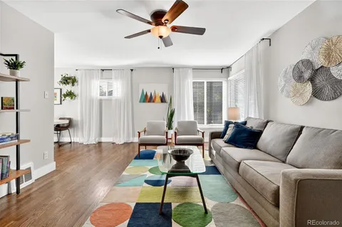 a kitchen with stainless steel appliances granite countertop a refrigerator stove a sink dishwasher and microwave oven